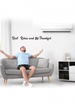 Man relaxing on a sofa with text 'Rest Relax and Be Thankful'
