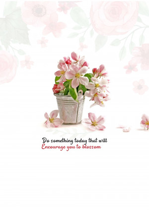 Pink flowers in a galvanized pot with inspirational quote