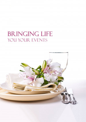 Table setting with flowers, plate, and silverware