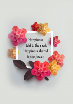 Paper flowers surrounding a white square with a motivational quote.