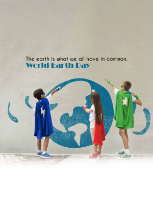 Children dressed as superheroes painting a globe on a wall for World Earth Day.