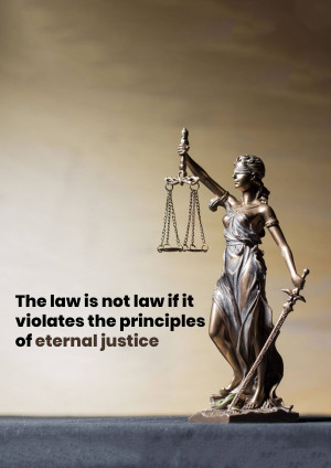 Bronze statue of Lady Justice holding scales and a sword, with a quote about eternal justice.