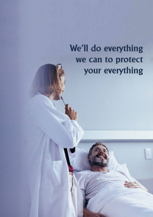 Doctor checking on a patient in a hospital bed.