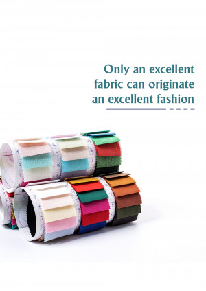 A stack of colorful fabric swatches with text overlay 'Only an excellent fabric can originate an excellent fashion'