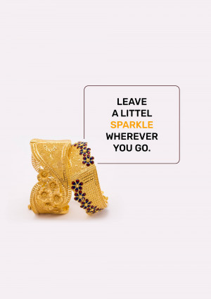 Close-up of a gold bracelet with a card displaying the quote 'Leave a little sparkle wherever you go.'