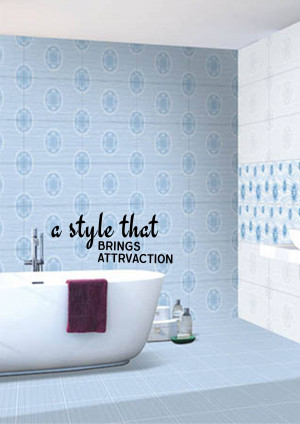 A modern bathroom featuring a white bathtub, patterned blue tiles, and a dark red towel.