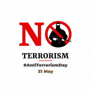 Image displaying a red 'NO' symbol with a silhouette of a person with a weapon crossed out, promoting Anti-Terrorism Day.