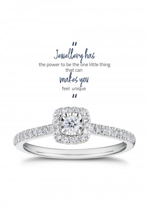 Close-up of a sparkling diamond engagement ring with a square halo setting.