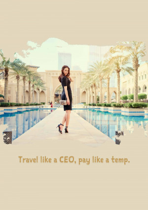 Woman walking towards the Burj Al Arab hotel in Dubai