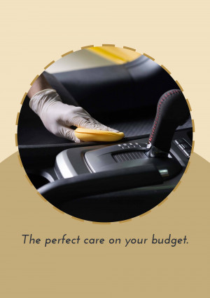 Close-up of a gloved hand cleaning a car interior with a sponge