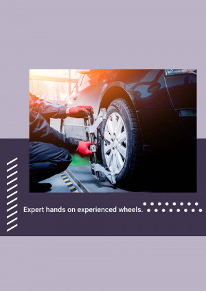 Mechanic performing wheel alignment on a car