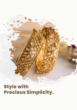 Close-up of ornate golden bangles adorned with pearls and precious stones.