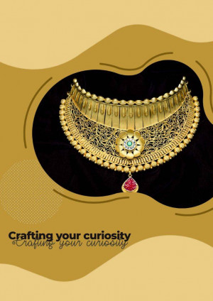 Close-up of a stunning gold necklace with intricate details and a red gemstone pendant.