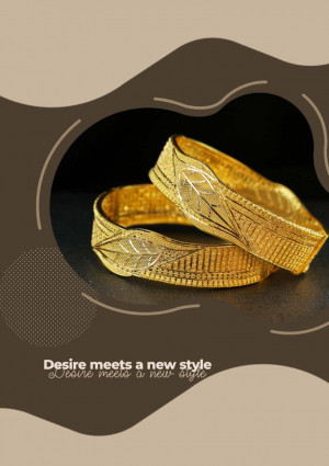 Close-up of two ornate golden bangles with leaf-like designs.