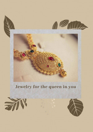 Close-up of a beautiful gold necklace with red and green gemstones