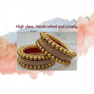 Close-up of golden handcrafted bangles with intricate beadwork