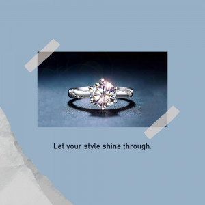 Close-up of a silver ring with a large, brilliant-cut diamond.