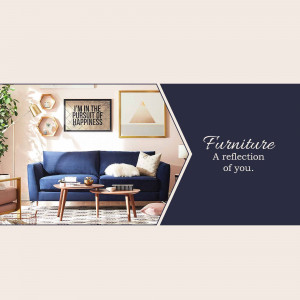 A stylish living room with a blue sofa and warm decor.