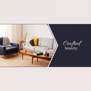 A stylish living room with a navy blue sofa and armchair, complemented by a wooden coffee table and neutral tones.