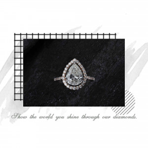 Close-up of a pear-shaped diamond engagement ring with a halo setting on a dark background.