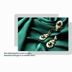 Close-up of emerald and gold earrings and a ring on a green silk background