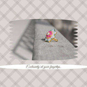 Close-up of a delicate floral diamond nose pin on a concrete surface