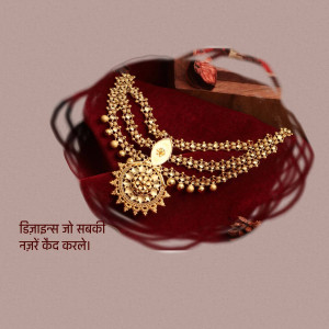 Close-up of a gold Indian necklace and maang tikka on a red velvet cloth