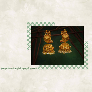 Close-up of ornate gold jhumka earrings with intricate detailing.