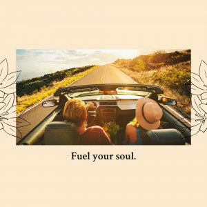 Couple driving in a convertible on a scenic road