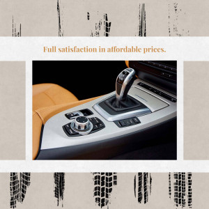 Close-up of a car's gear shift and interior console, highlighting luxury and affordability.