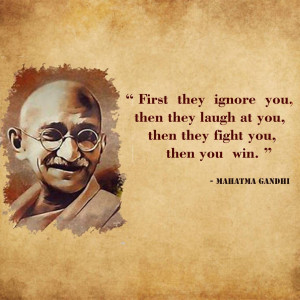 Portrait of Mahatma Gandhi with a famous quote about overcoming opposition.