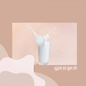 A glass of milk with a splash, against a soft pink background.