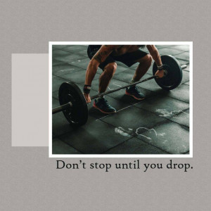 A muscular man performing a barbell squat in a gym.