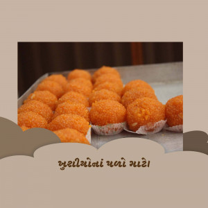 Close-up of a tray of golden-brown Gulab Jamun, a popular Indian dessert.