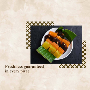 A plate of colorful fruit skewers with mango, pineapple, and chocolate, garnished with a green leaf.