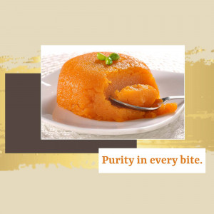 Close-up of a vibrant orange dessert with a spoonful taken out, garnished with a green leaf.