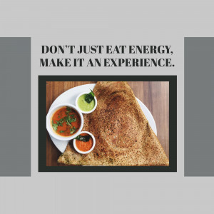 Close-up of a crispy dosa served with sambar and chutney