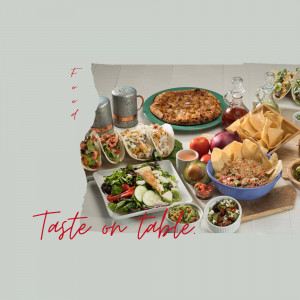 A vibrant spread of Mexican food including tacos, salads, and salsa on a table.