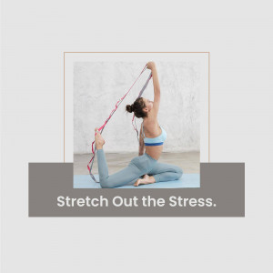 Woman practicing yoga with a stretching strap