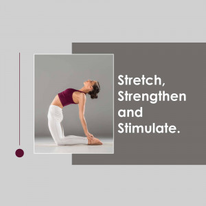 Woman performing a backbend yoga pose on a yoga mat.