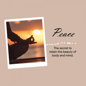 Silhouette of a person meditating in lotus position against a sunset backdrop.