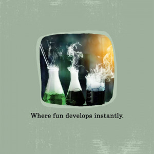 Three beakers with colorful chemical reactions and smoke