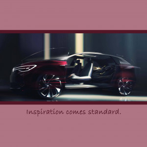 Side view of a red Volkswagen ID. VIZZION concept car with open doors