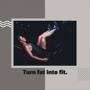 Woman exercising legs on a weight machine