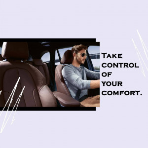 Man driving a car with comfortable leather seats and modern interior.