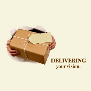 Hands holding a cardboard box with a tag, representing delivery and vision.