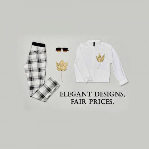 Flat lay of fall clothing and accessories on a gray background