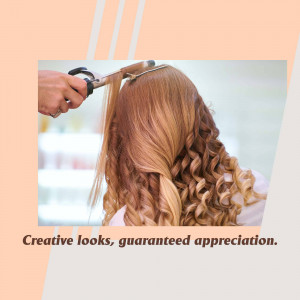 A hairdresser curling a client's long, wavy hair with a curling iron.