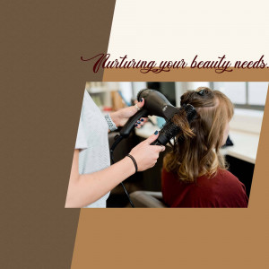 A hairstylist blow-drying a client's hair in a salon.