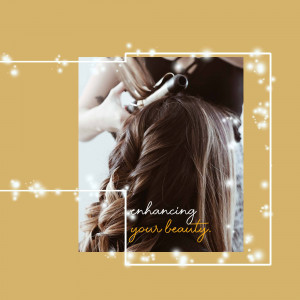 A woman getting her hair curled by a stylist with a golden aesthetic.